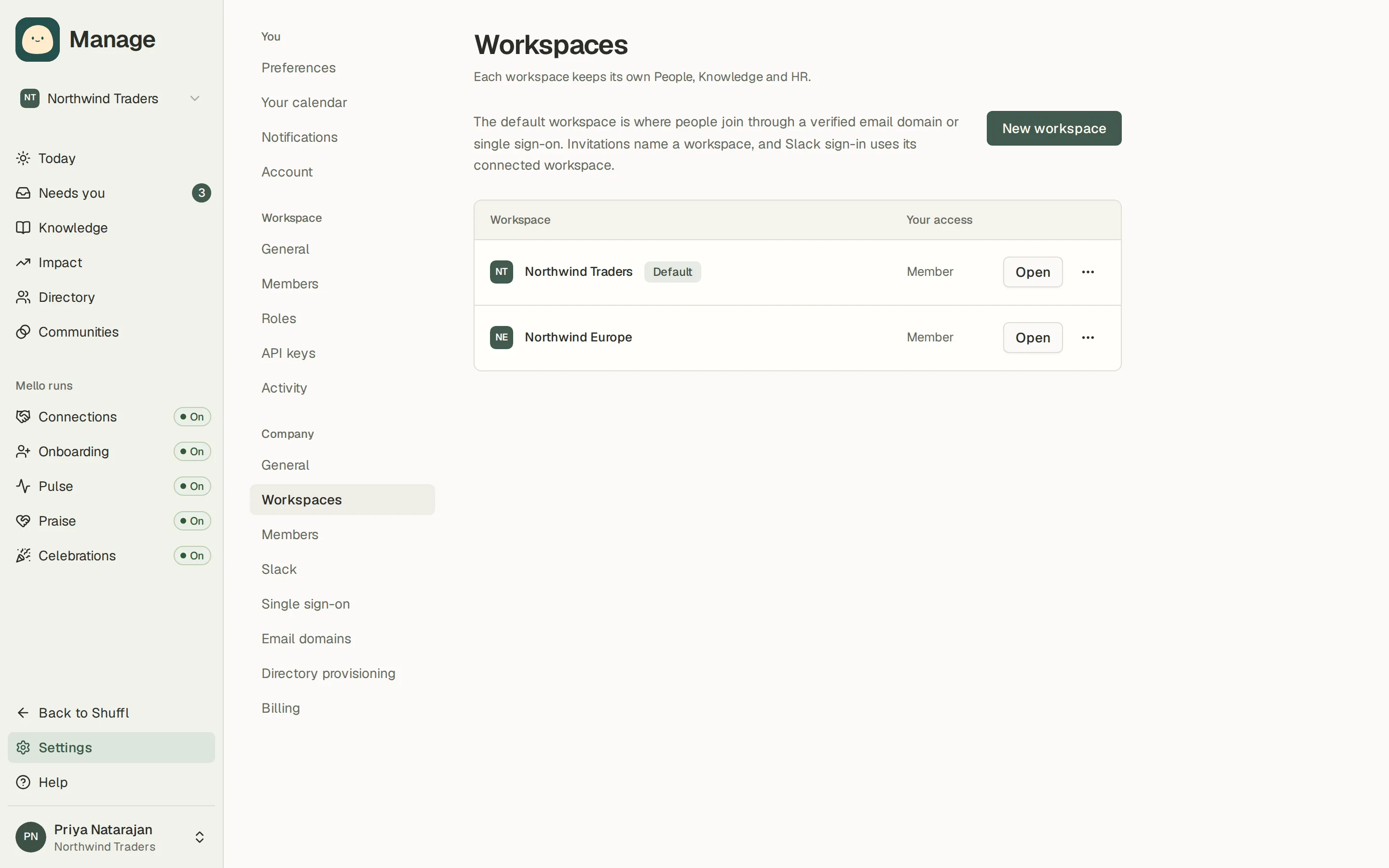 The Northwind Traders workspaces table, with a default workspace, a second workspace, an Open button and an actions menu on each row.